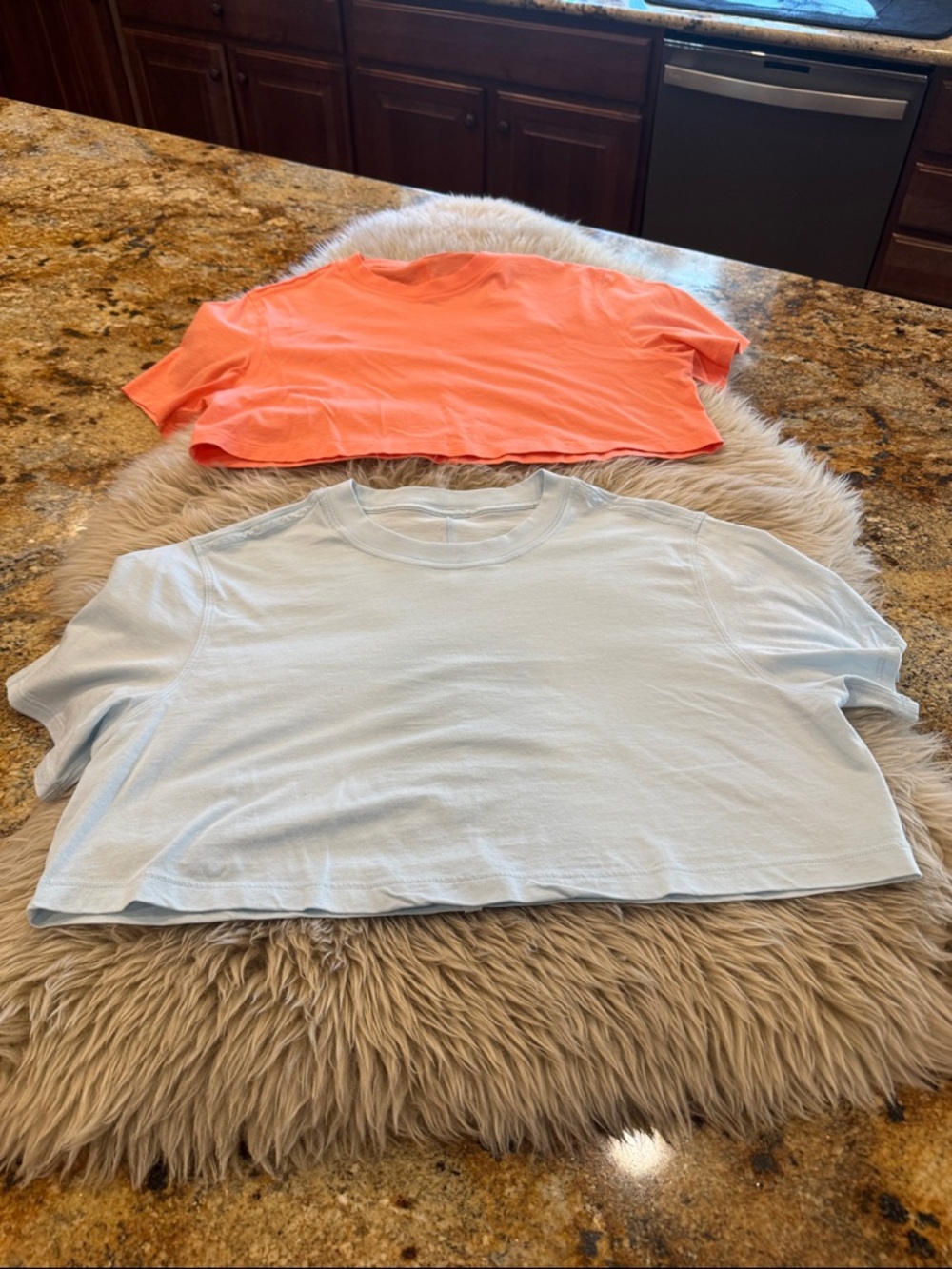 Bundle Lululemon cropped tees. Size 6 no tags. One blue one coral color.